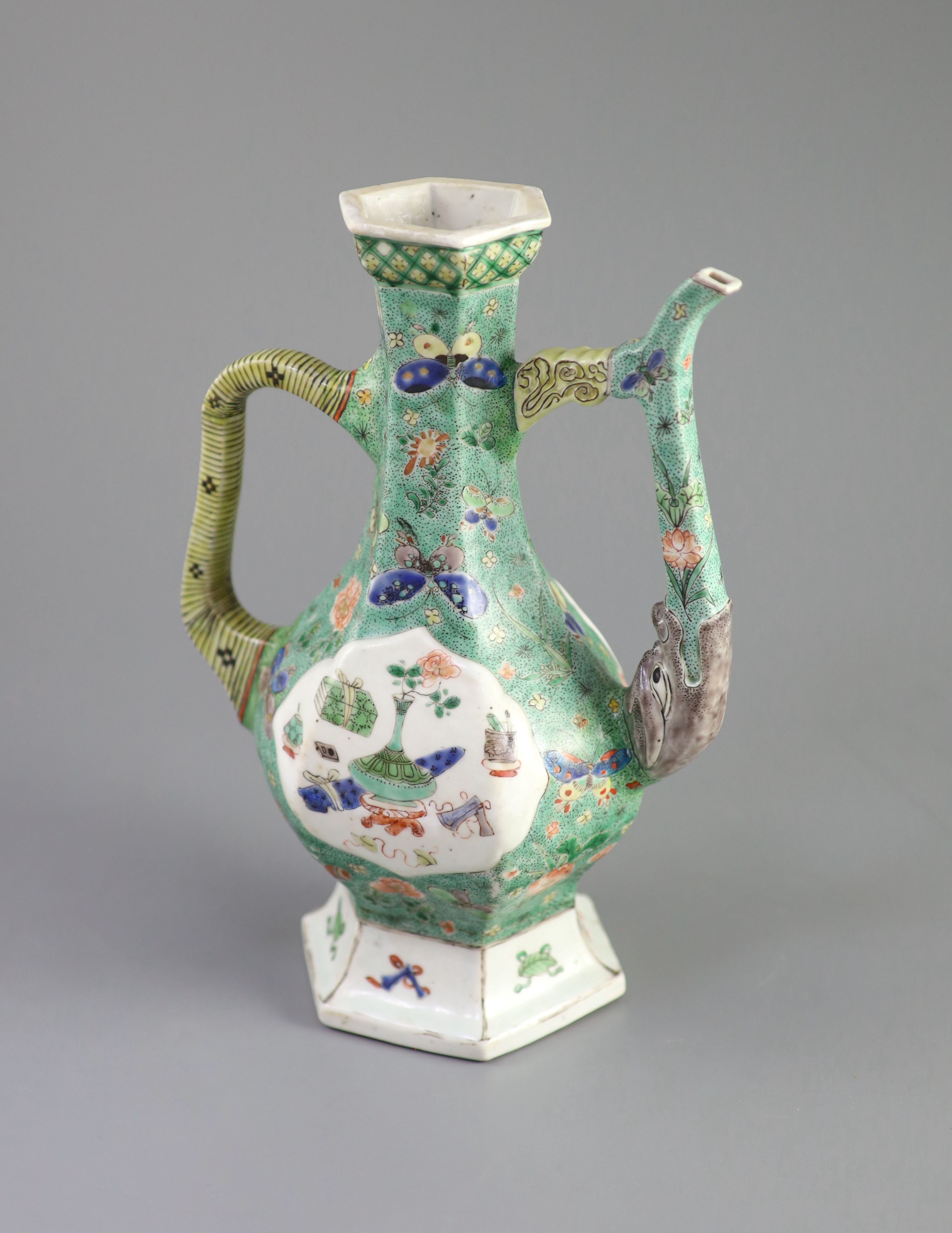 A Chinese famille verte hexagonal wine ewer, Kangxi period (1662-1722), 26cm high, restorations